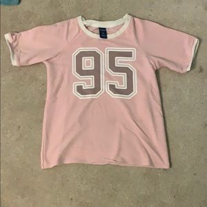 Pink shirt with 95 on it